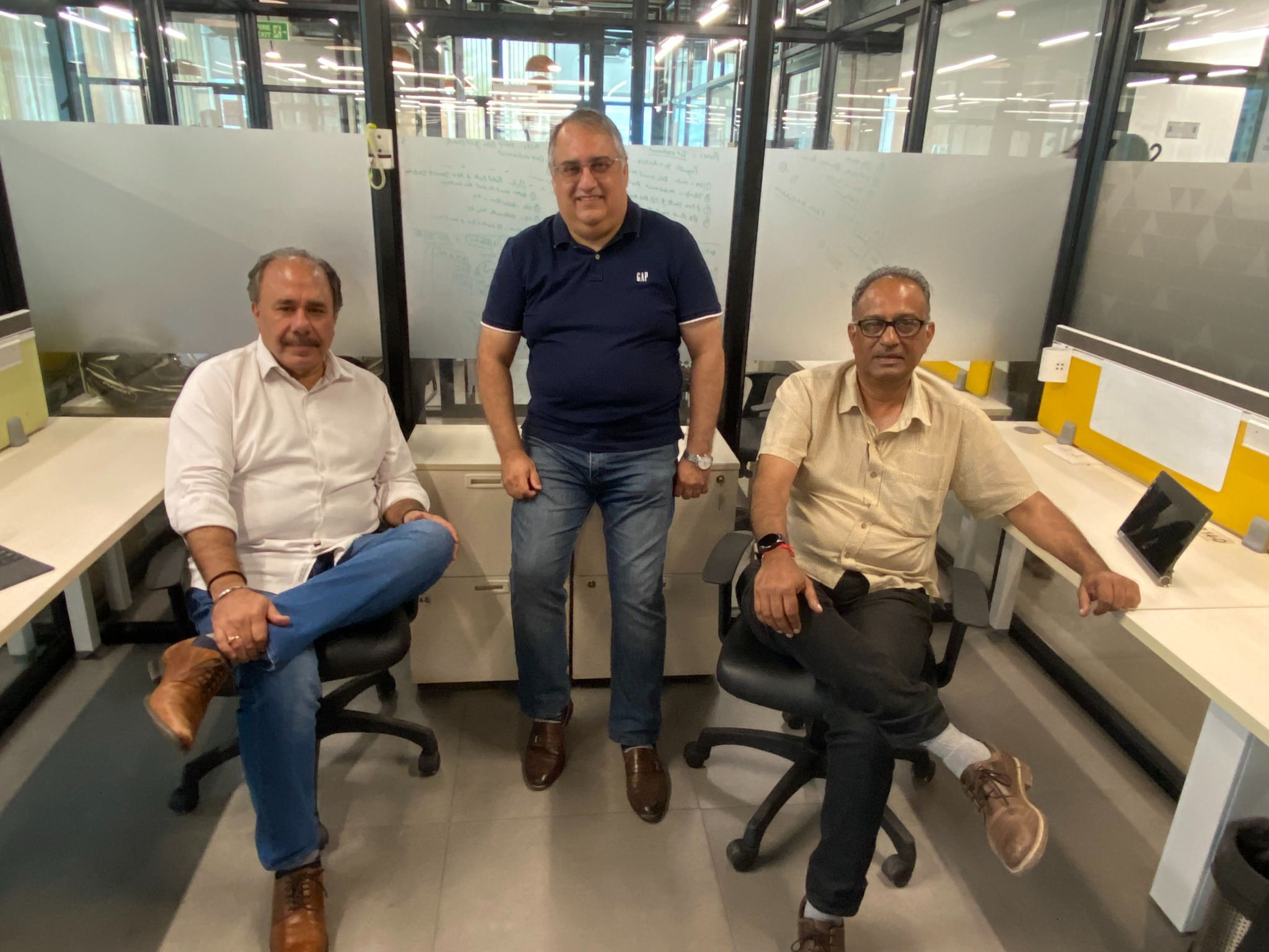The Evolution Strategy Advisors partners at the office desks